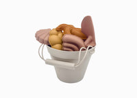 By The Beach | bucket + spade + pals